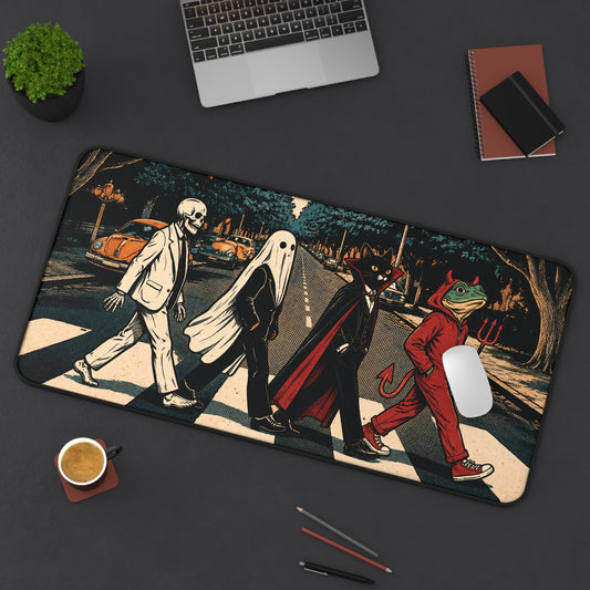 Halloween monster desk mat, angled view of crosswalk parade graphic artwork