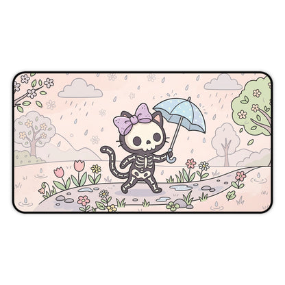 Pastel skeleton cat desk mat with bow and blue umbrella, rain clouds, flowers, rounded border