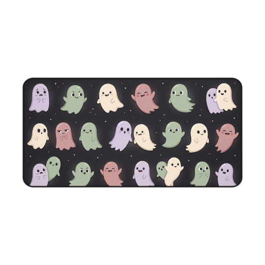 Pastel ghost print desk mat with rounded corners on dark base