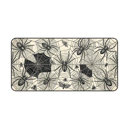 Spider web desk mat with vintage spiders and web pattern, black-and-cream border