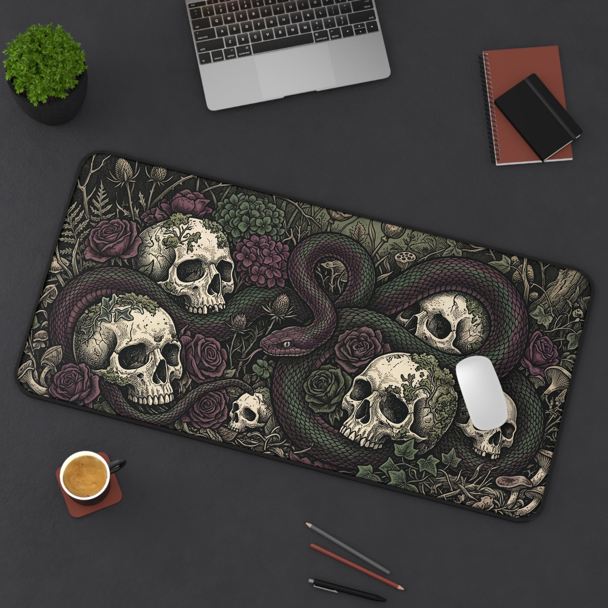 Dark skull and snake desk mat with rose garden pattern, curved edges and stitched border
