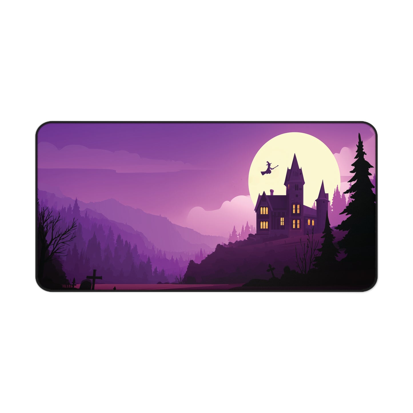 A rectangular desk mat with rounded corners featuring a purple and black illustrated landscape of a haunted castle, a full moon, mountains, and a witch riding a broomstick.