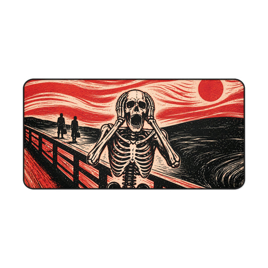 Halloween desk mat with illustrated screaming skeleton, red swirls, and dark landscape bridge