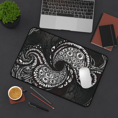 Desk mat with cosmic tentacle and eye graphic, rounded corners and stitched border