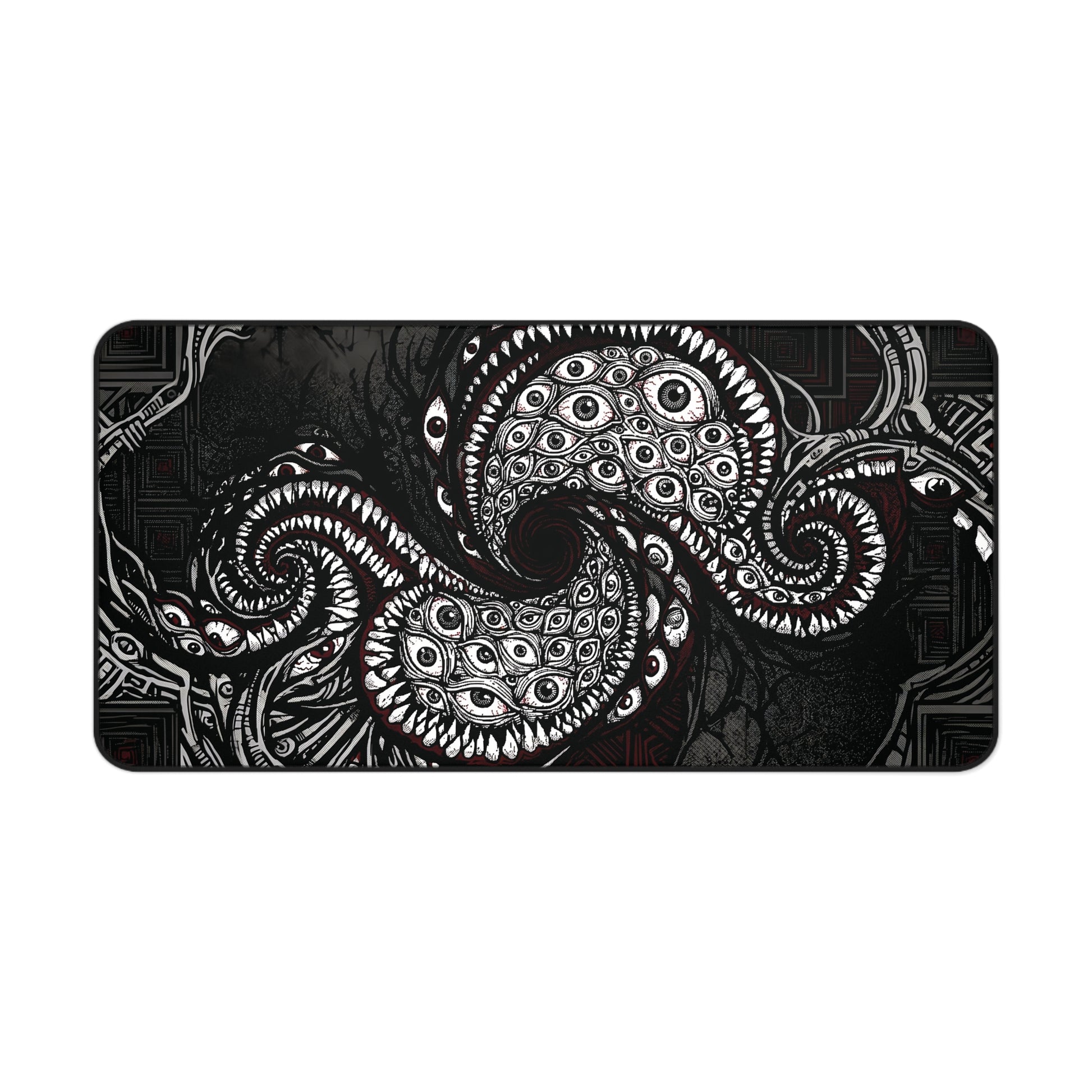 Black desk mat with white tentacle eye illustration, rounded corners and stitched border