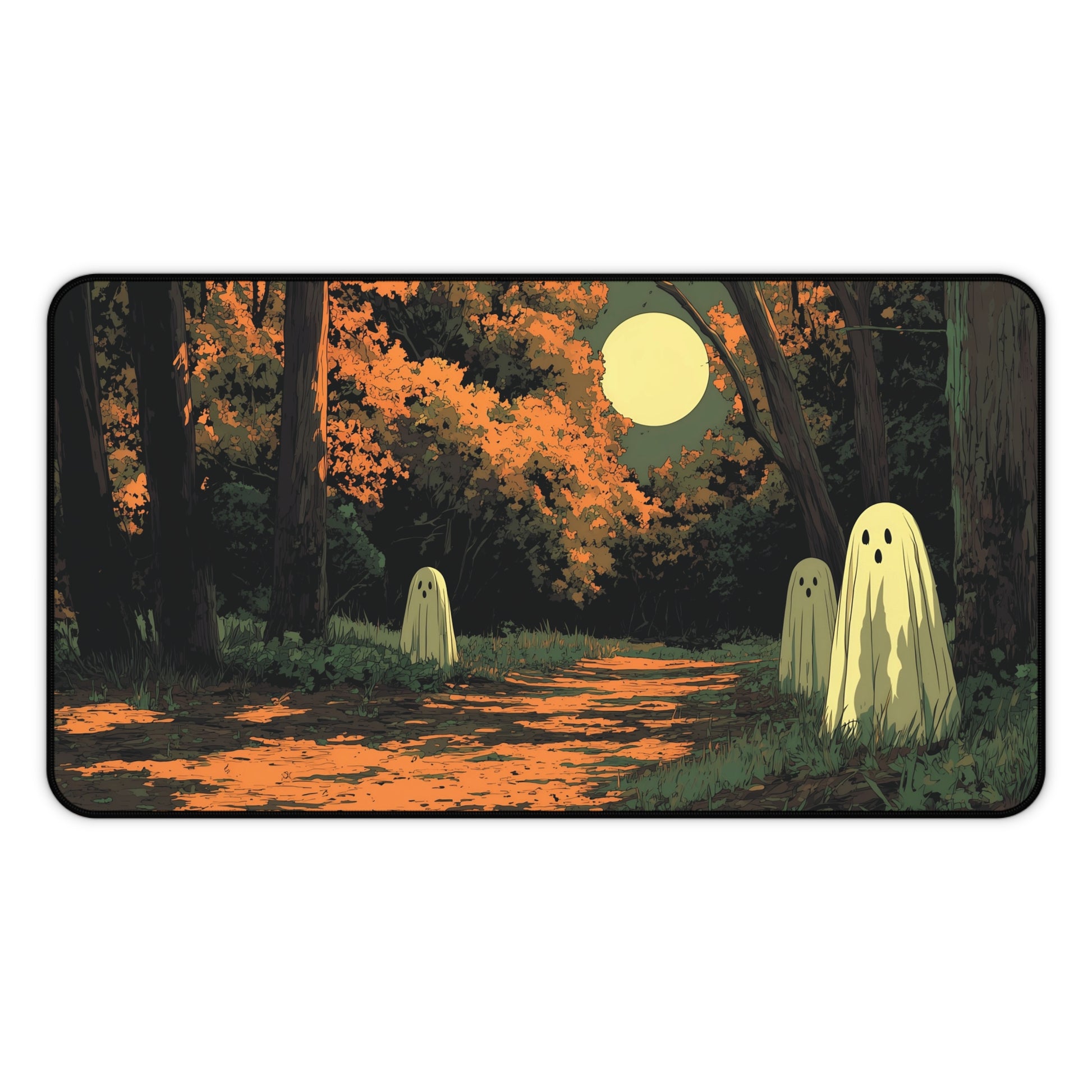 A rectangular desk mat with rounded corners featuring a Halloween-themed illustration of three ghosts in a forest path under a full moon.