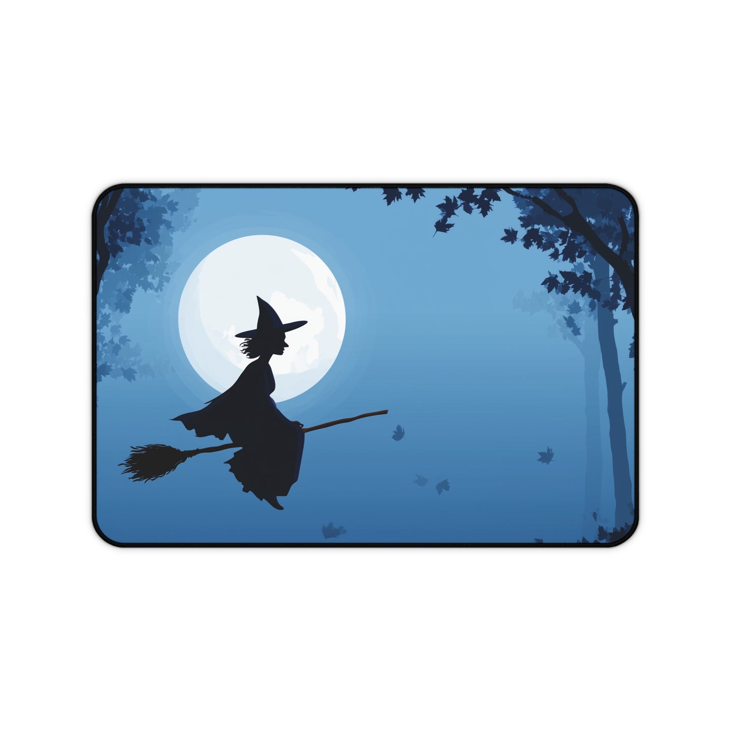 Rectangular blue desk mat featuring a flying witch silhouette with a large moon
