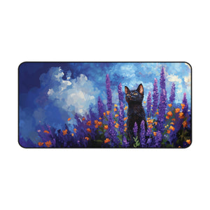 Cat and lavender flower desk mat with purple spikes, orange blooms, and blue clouds