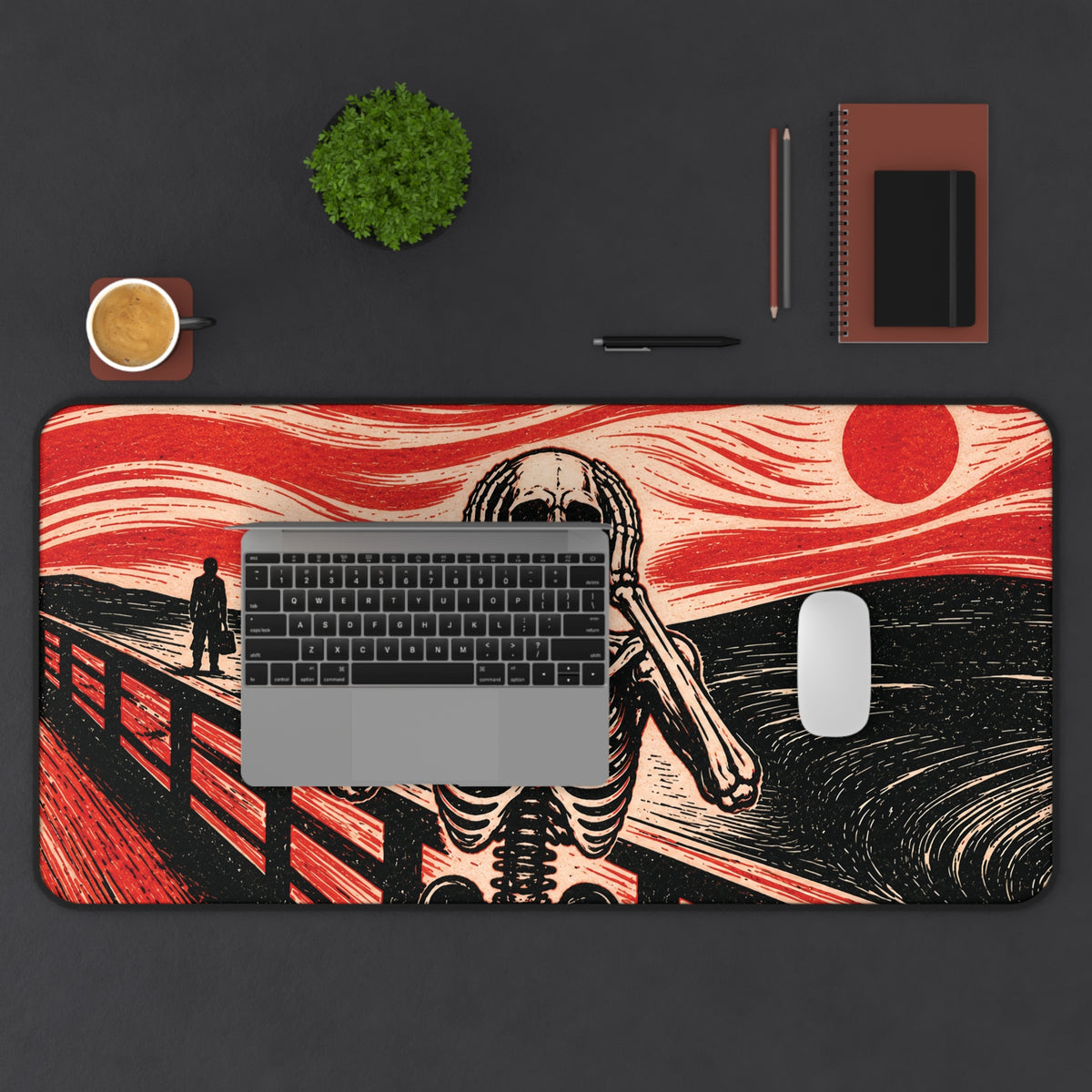 Halloween desk mat showing a screaming skeleton graphic across a red wave and dark ocean scene