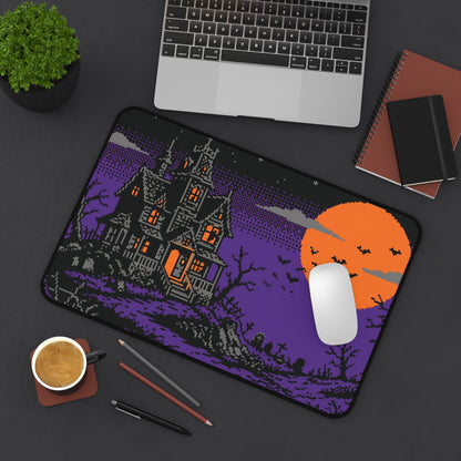 Haunted house retro 8-bit desk mat with orange moon and white computer mouse